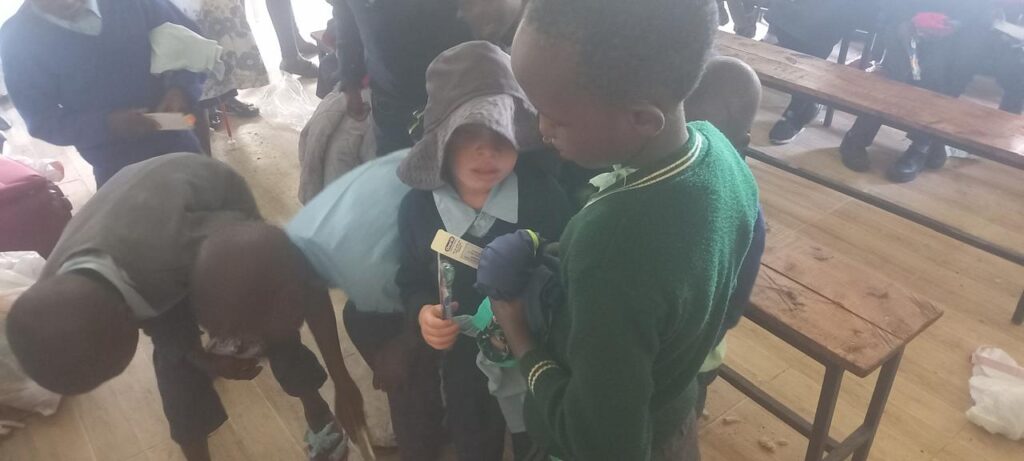 Kids Receiving the donations during Hellen's trip